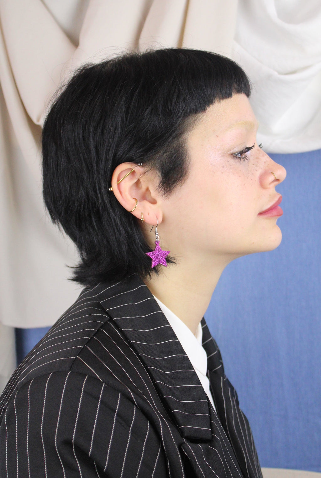 All That Glitters Purple Star Earrings